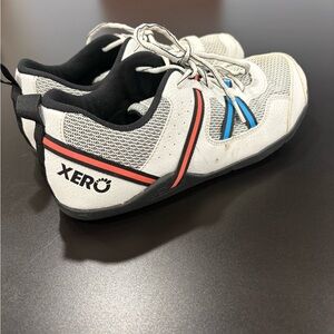 Xero Men’s Lightweight White Sneakers with Red & Blue Accents